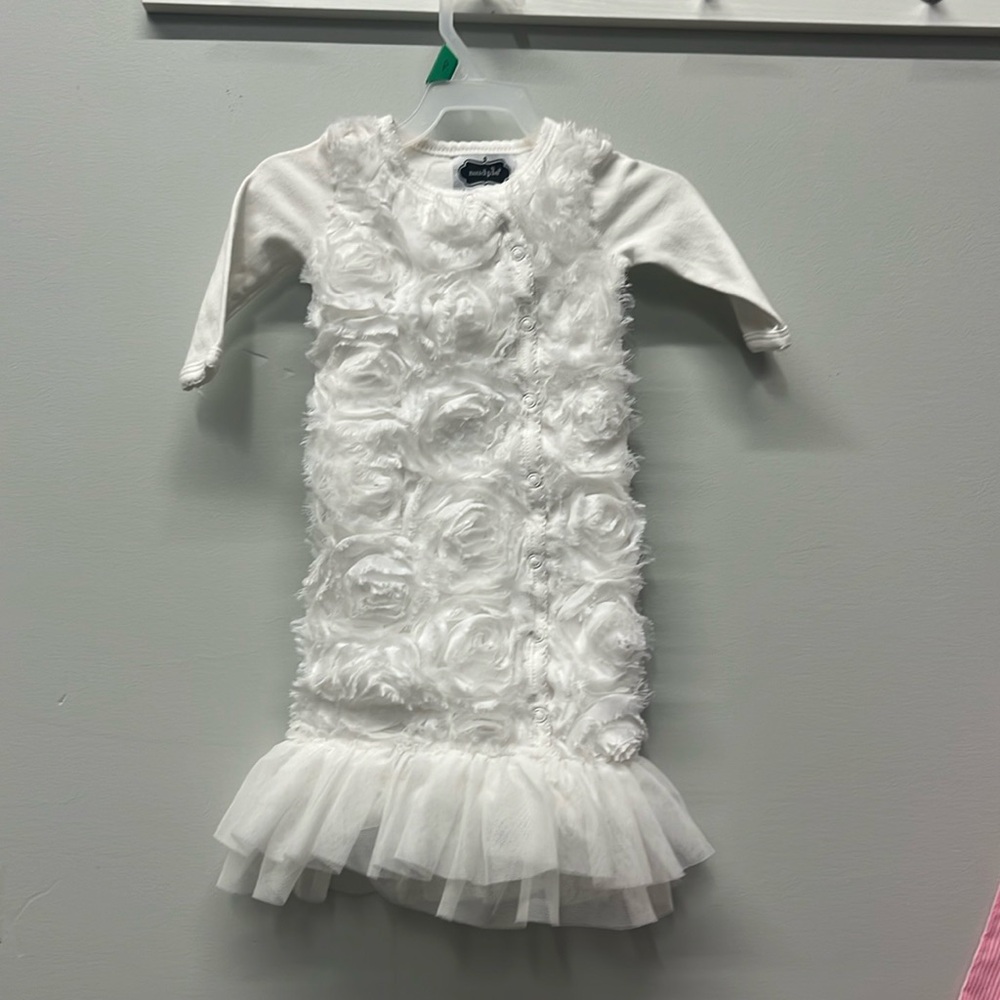 Mudpie one piece floral and tulle outfit.